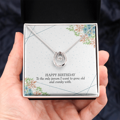 Crystal horseshoe pendant necklace close up