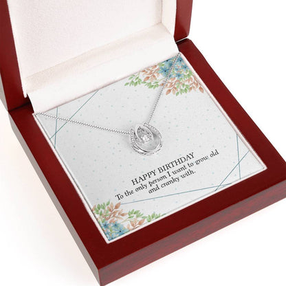 Lucky Horseshoe Necklace packaging with message card