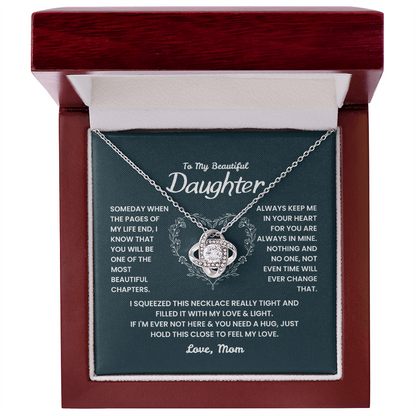 Love Knot Necklace worn by woman – beautiful birthday or Mother's Day gift from mom to daughter